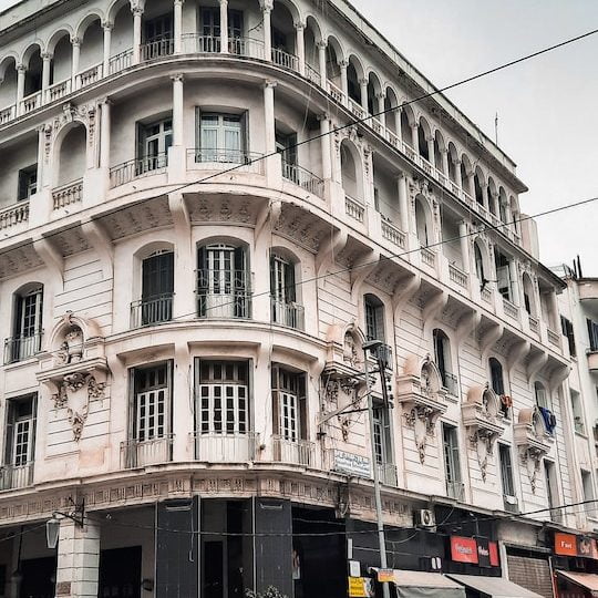 white and brown concrete building during daytime