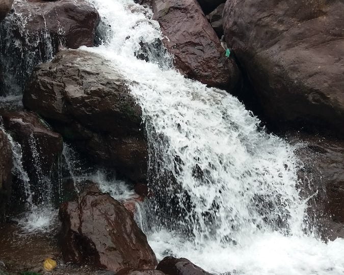 a small waterfall over rocks